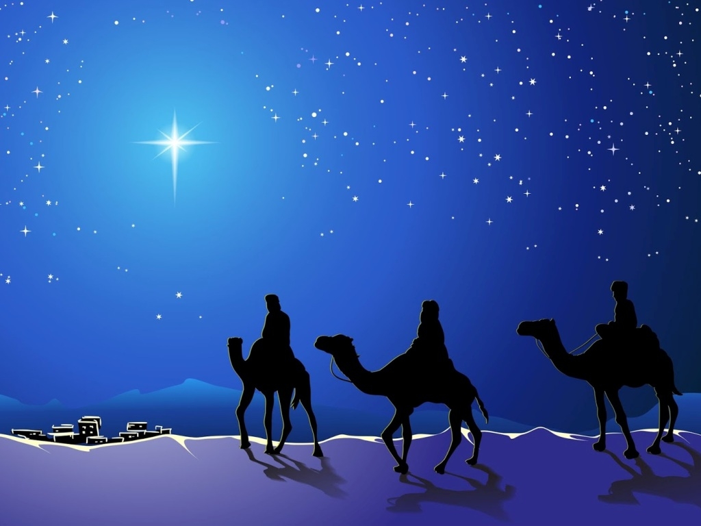 Los reyes magos siguiendo a la Estrella de Belén.