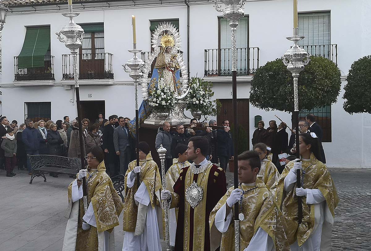 Numerosos fieles han acompañado a la Patrona durante el traslado hasta La Merced.