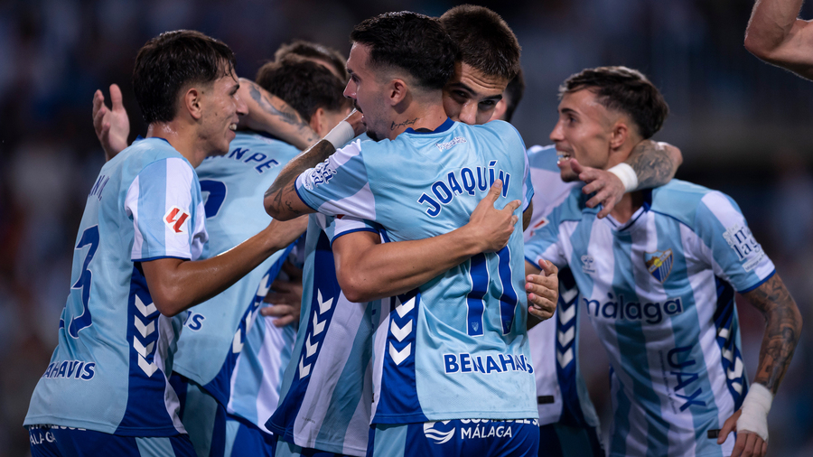 Jugadores del Málaga CF tras marcar un gol. Foto: Málaga CF.